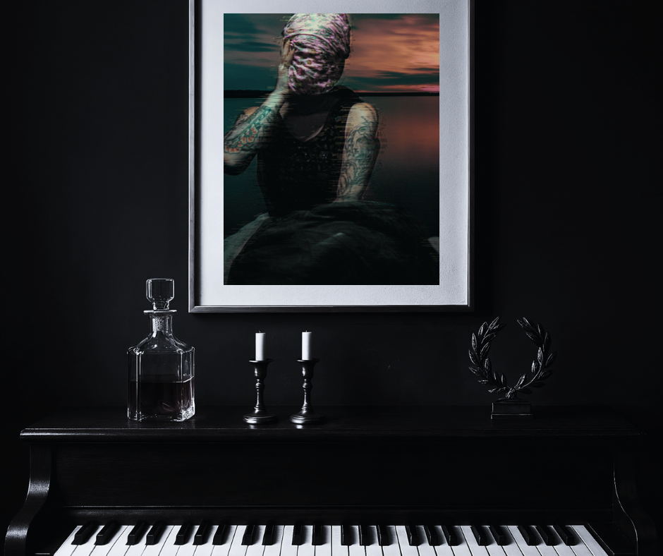  dark black wall with a person's head covered with sunset in the background