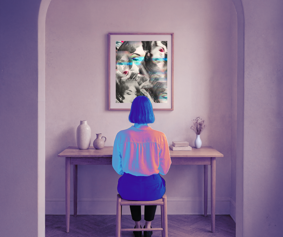  woman sitting at a table looking at photo